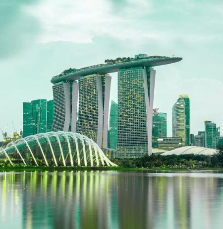 Modern buildings in town with lake next door